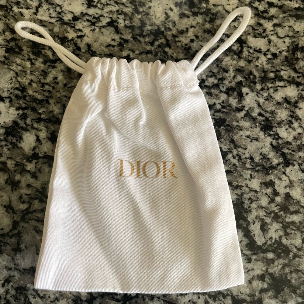 Dior Cream Drawstring Pouch with Gold Logo